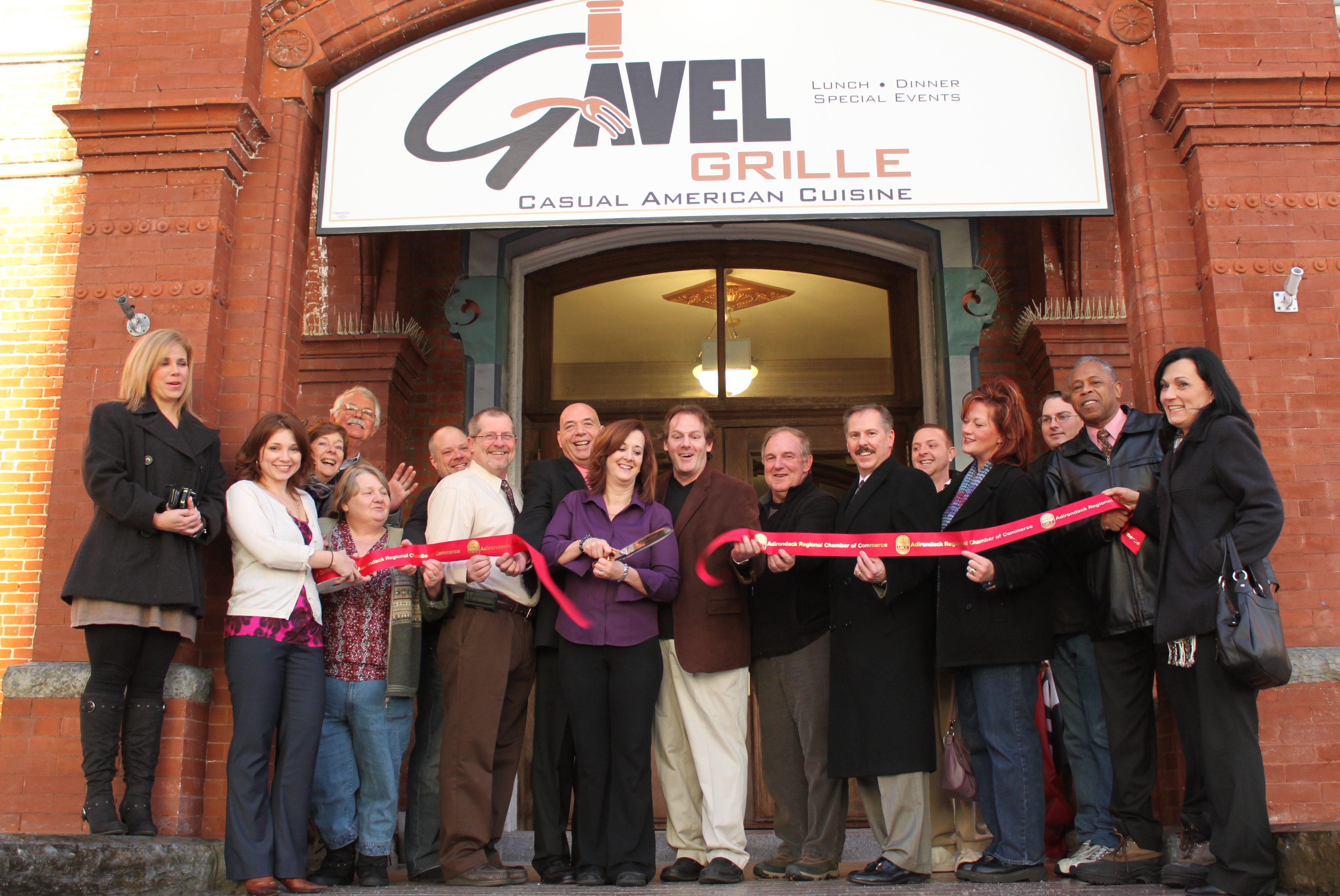 gavel grille ribbon cut pg1.jpg