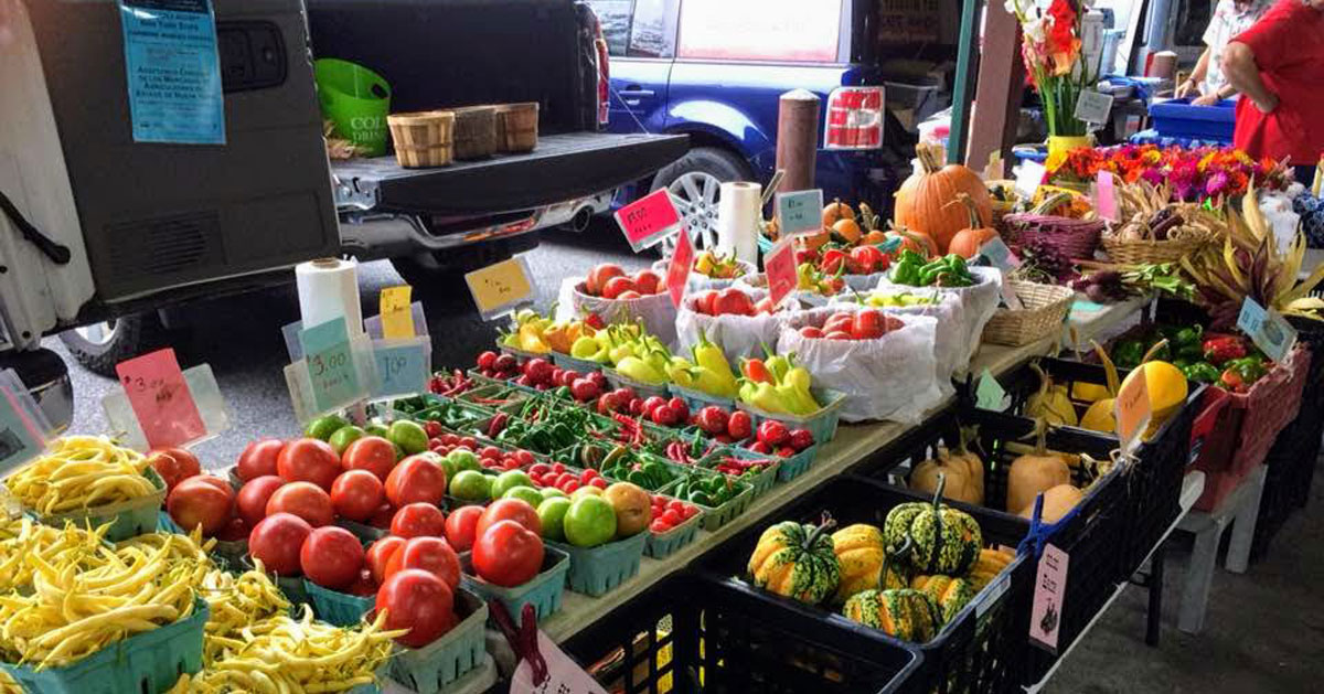 fresh produce at a farmers market stand