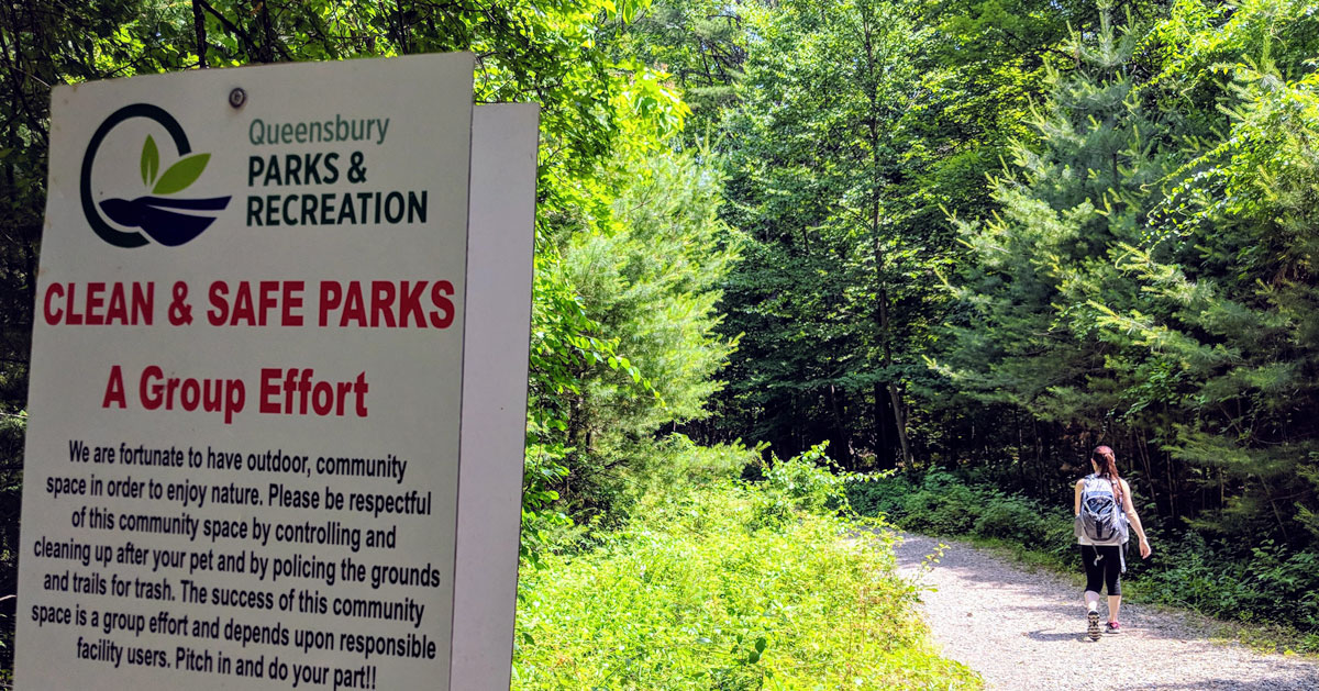 Queensbury Parks & Rec sign, girl hiking